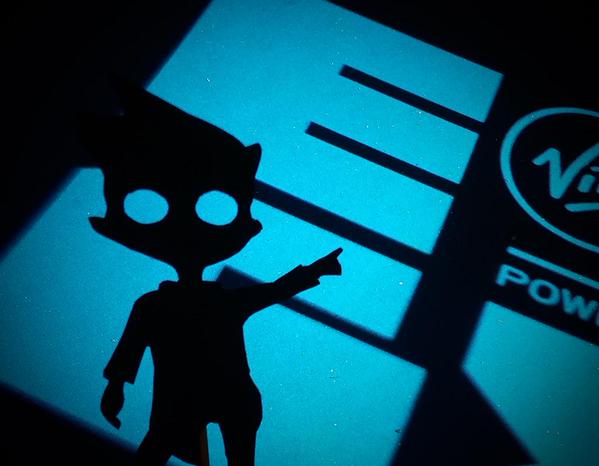 Shadow from Shadow Puppeteer pointing at EGX logo