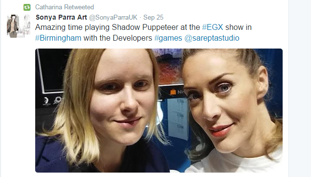 Developer Catharina Bøhler and @SonyaParraUK  in front of Shadow Puppeteer stand during EGX